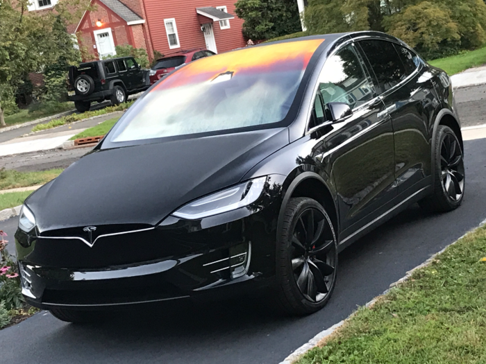 Finally, the Model X, a glossy black. Our fully loaded loaner was a P100D version — largest battery pack, all-wheel-drive, and a third row of seats. It tipped the cost scales at around $150,000.