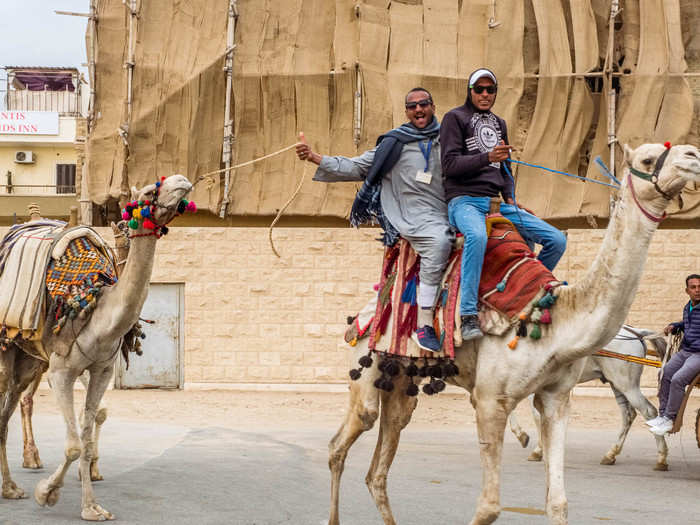 Before you walk into the complex, touts will try to convince you that the walk to the pyramids is very long and difficult, necessitating a ride in a carriage or on a camel. Abrahim, my host at Pyramid Lofts, said it shouldn