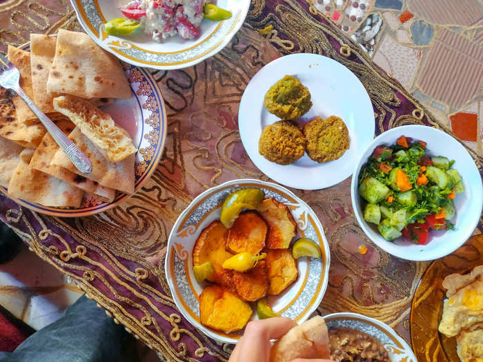 Breakfast came included with my room at the guesthouse. It was a tasty mix of Egyptian salads, baladi bread, falafel, and ful medames, an Egyptian dish of spiced cooked fava beans.