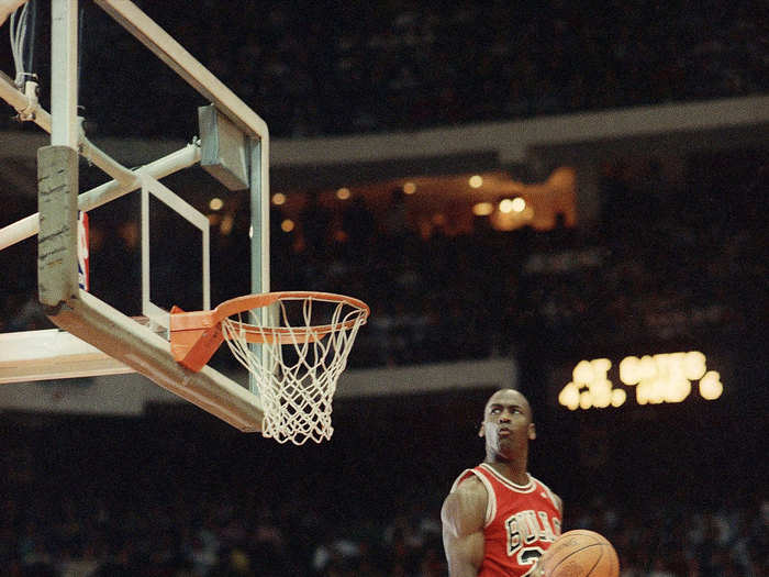 His Airness rocked the 1988 slam dunk contest with a number of legendary dunks, including this impressive reverse.