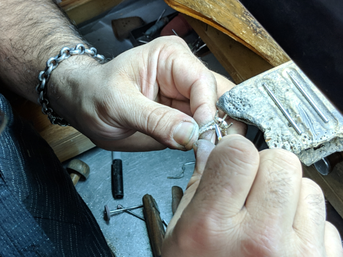 Diamond setting comes near the end of the engagement ring making process, just before polishing and any possible engraving. Tashchyan let me watch over his shoulder while he worked, and I couldn