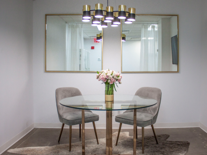 The space was full of mirrors and glamorous gold accents ...