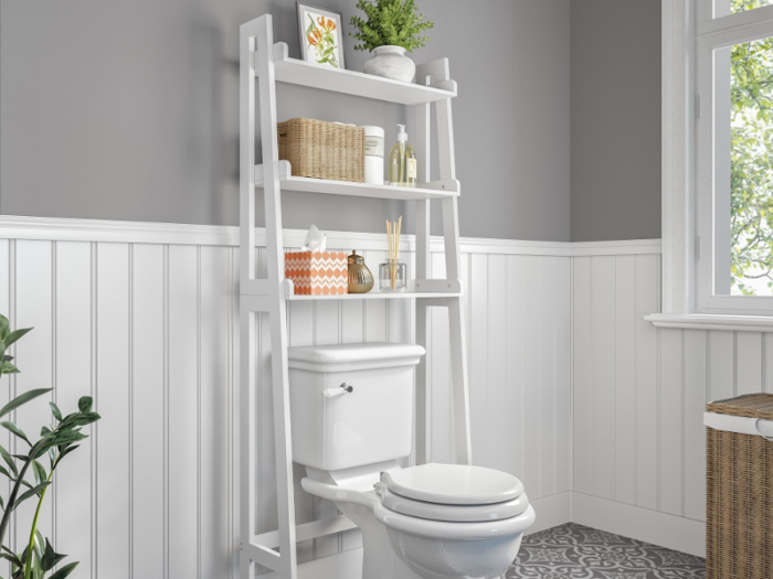 A vertical bathroom shelf