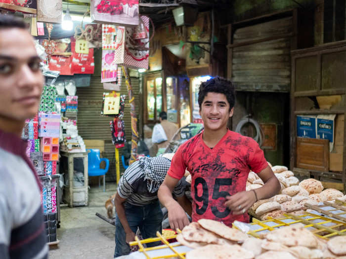 Khan Al Khalili is a good place to try out street foods. There are tons of restaurants, cafes, and bakeries tucked into back alleys and corners of the market. Bakers walk up and down rows carrying crates of fresh baladi bread. At seemingly random points, the baker would set the crate down and sell bags of the bread to nearby restaurant owners. When we tried to buy one piece of bread, he looked at us like we were crazy.