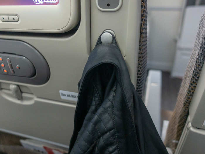 The seat back has a hook for you to hang your jacket.