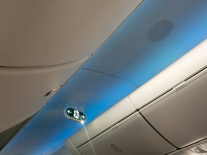 The Dreamliner has lots of special features to make long flights more comfortable. The ambient light in the airplane changes throughout the flight to help your body adjust to your new location. Shortly after boarding, the lighting changed to a cool, calming blue.