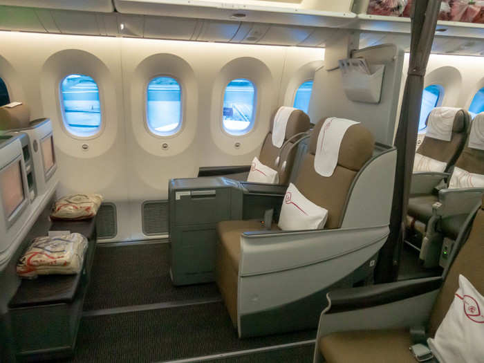 The 30 business class seats on the 787-8 are not as secluded as those on say, Emirates Airbus A380 planes, but they do look like a joy to sit in. Those are flatbed seats with 74 inches of pitch and 31 inches wide. Just about anybody but Andre the Giant could take a nap.