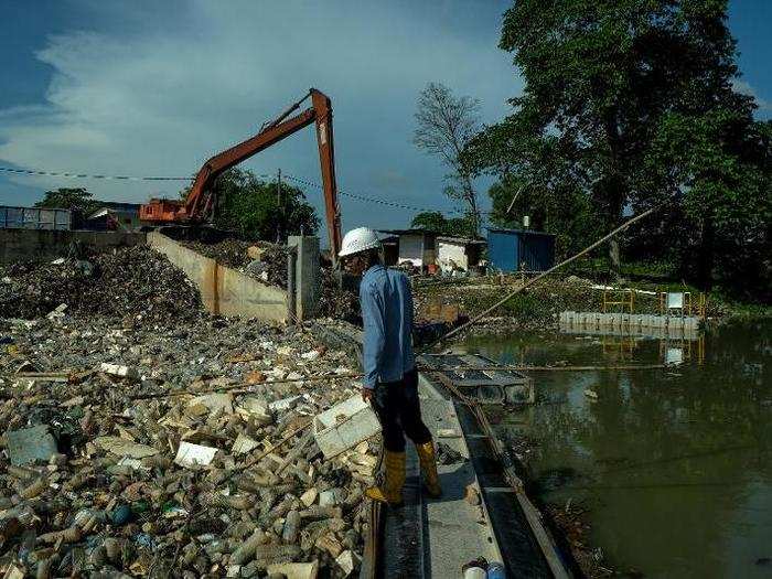 The piles of trash are a problem throughout this region of Malaysia. In October, a worker in Pulau Indah told Reuters there were at least eight illegal factories in the island district.