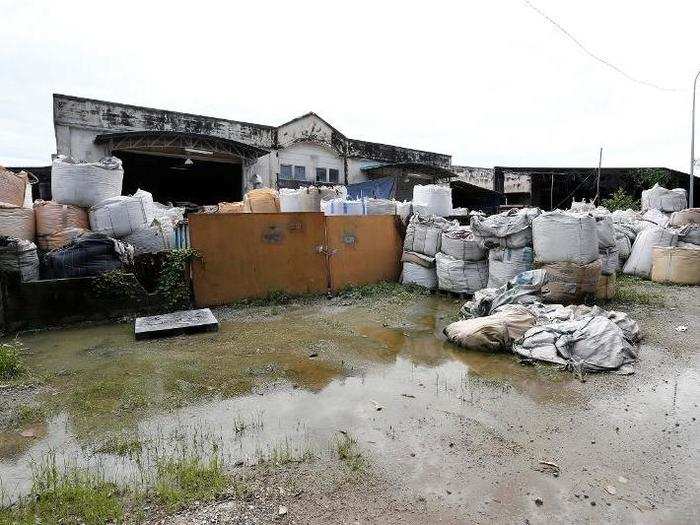 Local residents have said they started to become ill around the same time that the garbage piles arrived.