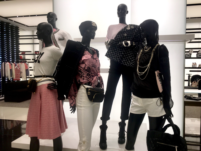 A fully accessorized group of mannequins marked the entryway to the back part of the store ...