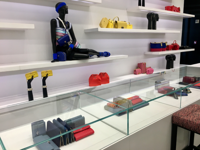 Shelves behind the counter grouped bags by color, a theme repeated elsewhere throughout the store.