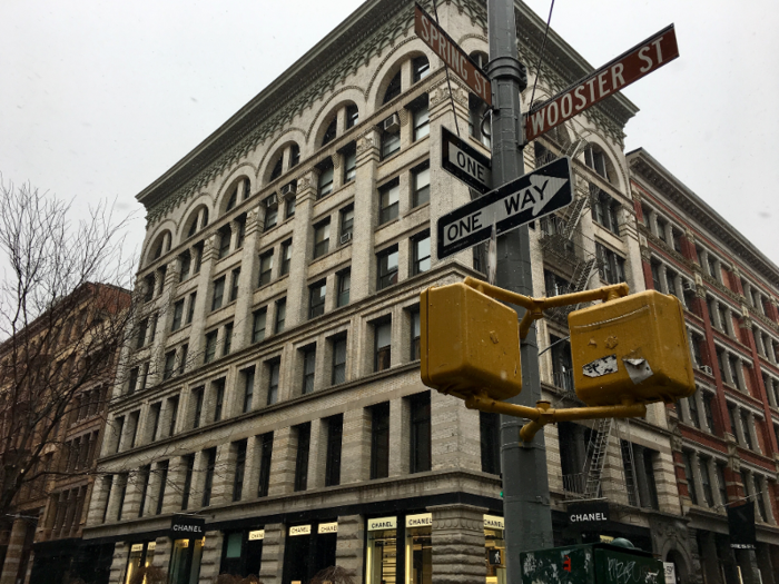 The store itself sits at the corner of Spring Street and Wooster Street.