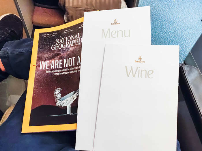 I snagged a copy of the latest National Geographic, which I rarely get to read these days. A flight attendant dropped off the menu and wine list. We hadn