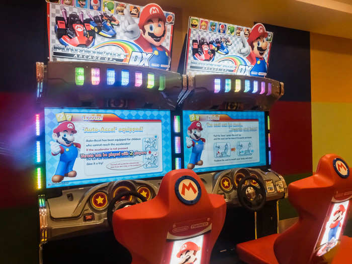 ... in the shape of two Mario Kart DX arcade machines, which you can play for free.  I am apparently still nine years old, because I spent a solid 20 minutes racing.