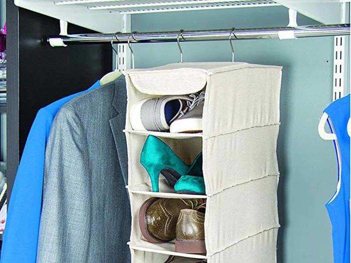 A 10-shelf shoe organizer for organizing sweaters.