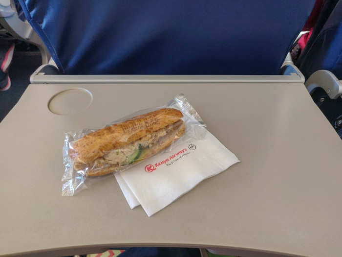 I was surprised that even on such a short flight, Kenya Airways offers close to full food and beverage service. We got the first round of nuts and drinks and then a second round with a sizeable, fresh-tasting chicken salad sandwich. It