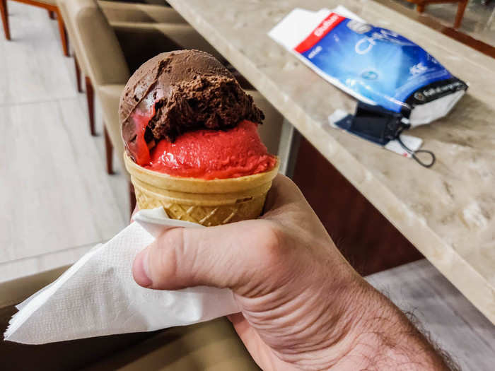 ... and get a cone of ice cream. I opted for the Swiss chocolate and the Raspberry sorbet. Like President Trump, I got two scoops of ice cream, not one.