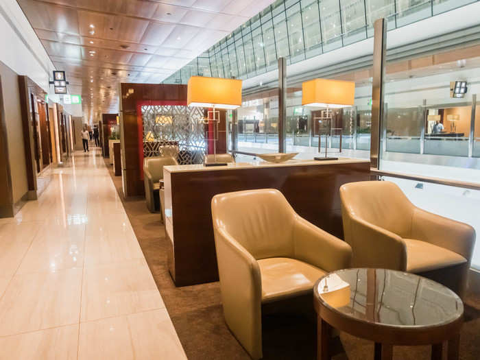 The lounge spans nearly all of the second floor of Concourse B, with seating on either side of the airport, looking down at the economy passengers below.