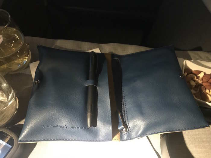 The kit was a blue leather pouch that contained a pen...