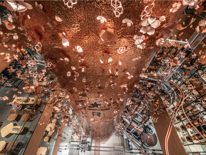 Inside is the largest Starbucks Roastery coffee cask in the world, which stretches to 55 feet.