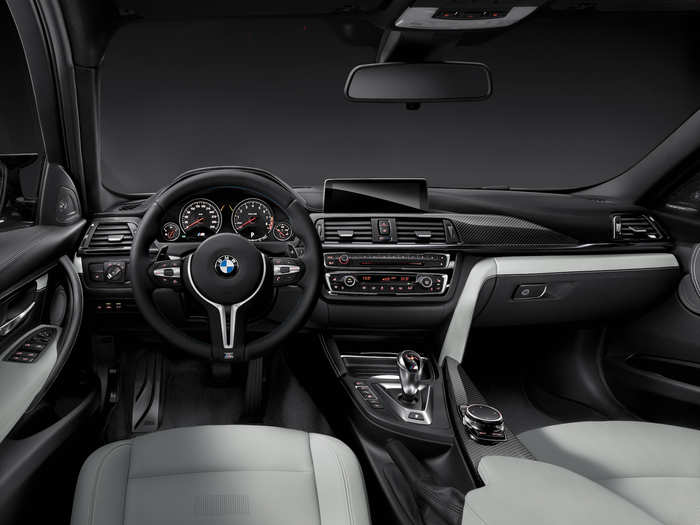 No minimalist interior here. Instead, the M3 presents a familiar BMW cockpit that