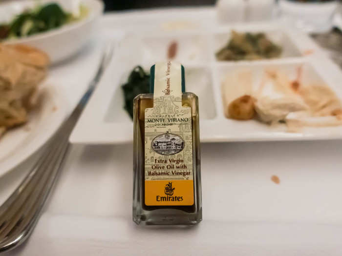 Each meal comes with a small seasonal salad and a little bottle of olive oil and balsamic vinegar dressing.