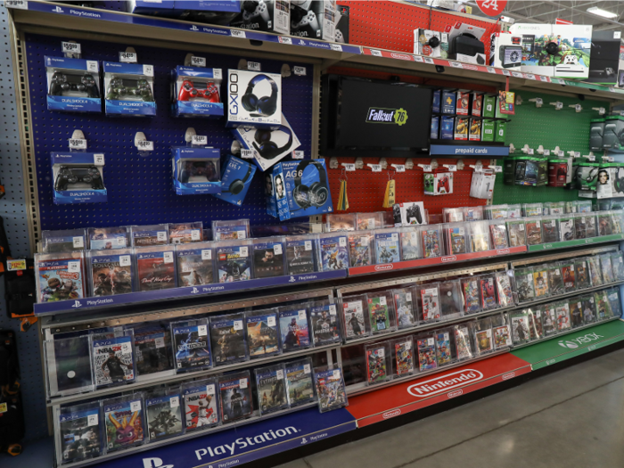 The aisle over is carved out for electronics, like video games and game controllers.