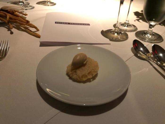 Soon, the first course came out: "Aula in Tempura." This dish was a fish-and-chips-inspired freshwater fish, fried and served with an onion carpione ice cream. The menu described the dish as intended "to remind of traditional preservation methods while looking through a contemporary lens."