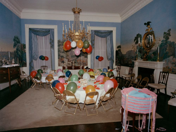 President John F. Kennedy and first lady Jackie Kennedy hosted a birthday party for daughter Caroline Kennedy and son John Jr. Kennedy on November 27, 1962. The part was full of colorful balloons.