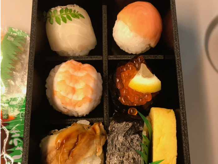 I opened my bento box and to my delight the sushi looked pretty good for being in a box (There was another row that didn