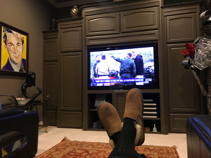 By about 7:45 p.m., Caballero is settled back in his media room, where he either watches a football game or the news with Sammy.