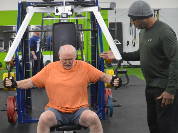 Caballero does a combination of strength and cardio exercises with his trainer, John.