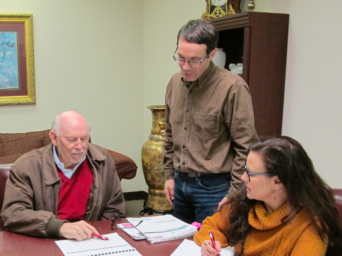 At 2:15, Caballero meets with the MLS project manager, David, and office supervisor and photos manager, Casey, to review progress on the upcoming second version of the HomesUSA.com platform.