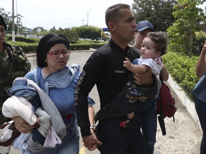 Guardsman Sgt. Javier Gonzalez said the thought of his 9-month-old son suffering without milk or diapers helped him overcome the fear of being killed if caught defecting. "I deserted for the life of my son. We