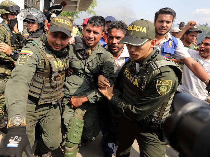 Torres, a driver, had access to armored vehicles, which he and others used to cross the Simon Bolivar Bridge to reach Colombia, breaking through barricades and hitting a woman in one of the most dramatic scenes on February 23. The woman wasn