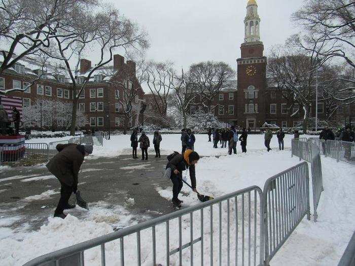 Volunteers shoveled snow to clear space for the event.