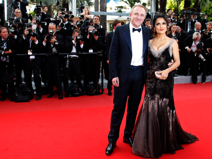 ... along with red carpets with his wife, actress Salma Hayek.