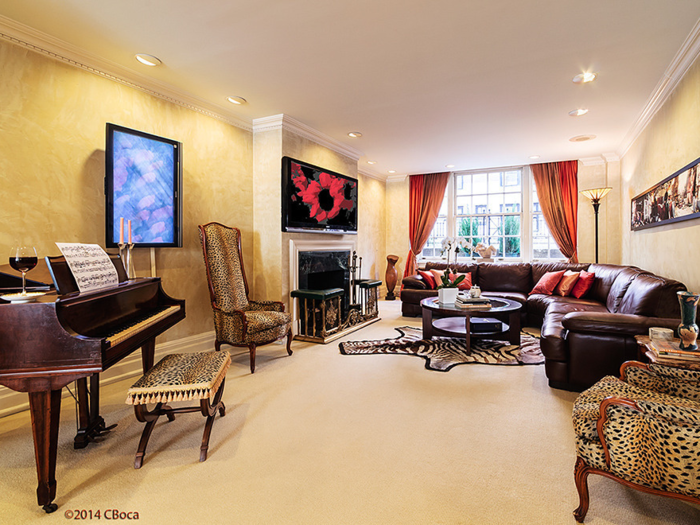 ... especially the large living room, which included animal-print chairs and a large, decorative rug.