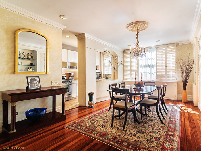 Just off the kitchen, the spacious dining area included old-fashioned chandeliers and decorations.