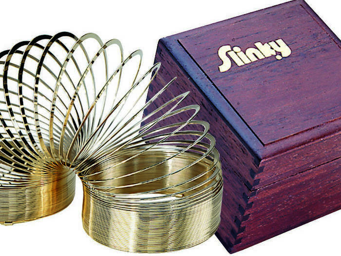 The Slinky, created by accident by Richard James, is now in the Toy Hall of Fame, with over 350 million sold and profits reaching $3 billion.