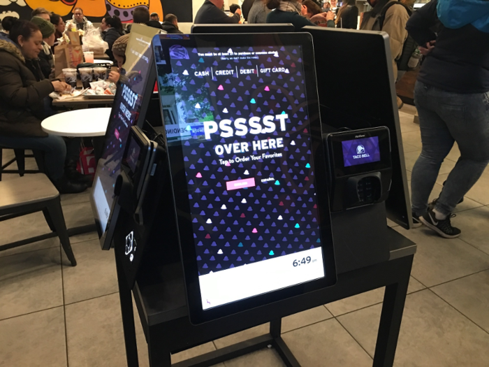 Customers ordered their food on large computer kiosks instead of at the counter.