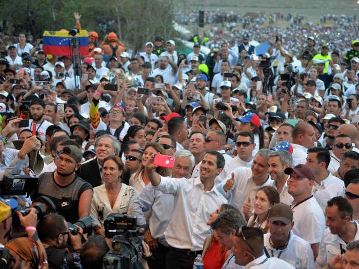 On February 22, Guaidó defied his travel ban. He left Venezuela to attend the "Venezuela Live Aid" concert in Colombia, organized by British billionaire Richard Branson.