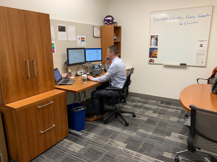 He arrives at the office on Market Street at 8:45 am and starts to check in with his team through emails and conference calls.