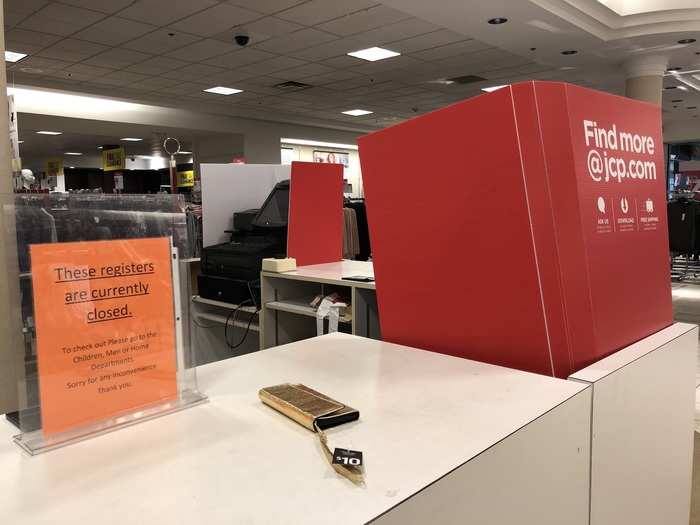 Signs covering these closed registers encouraged shoppers to visit the company