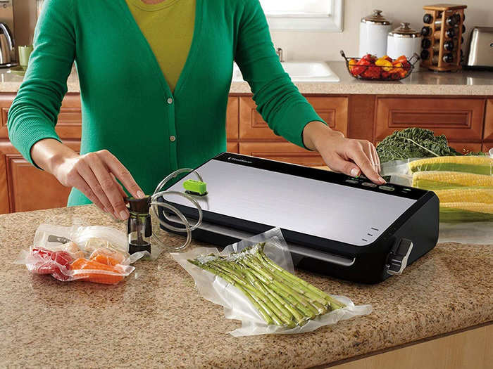 A vacuum sealer machine to save food