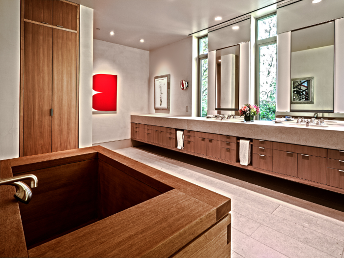 The master suite includes a bathroom with a Japanese soaking tub.