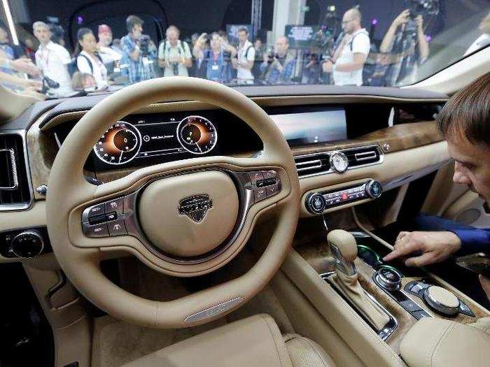 The interior of the Senat is packed with leather and wood accents along with a modern infotainment system.