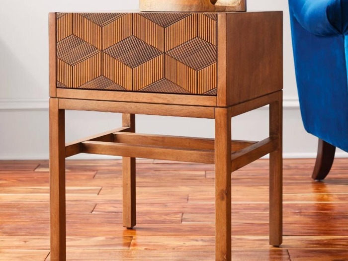 An accent table featuring geometric embellishments