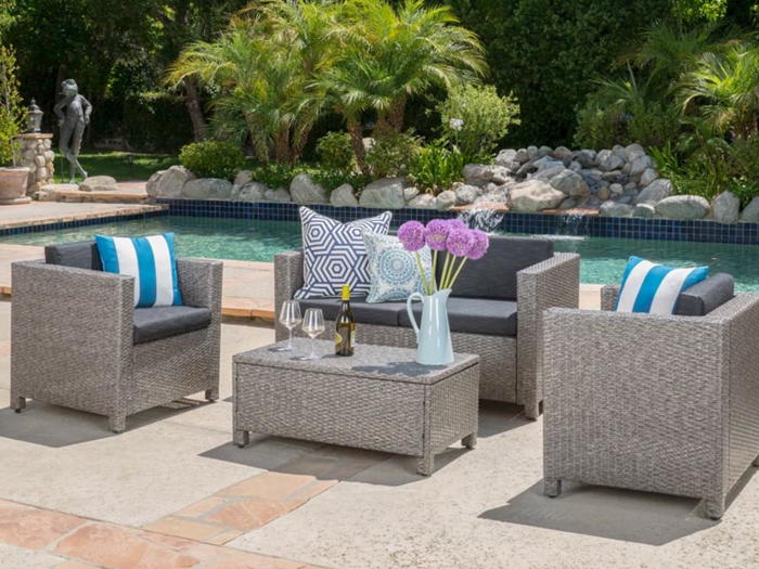 A full wicker patio furniture set