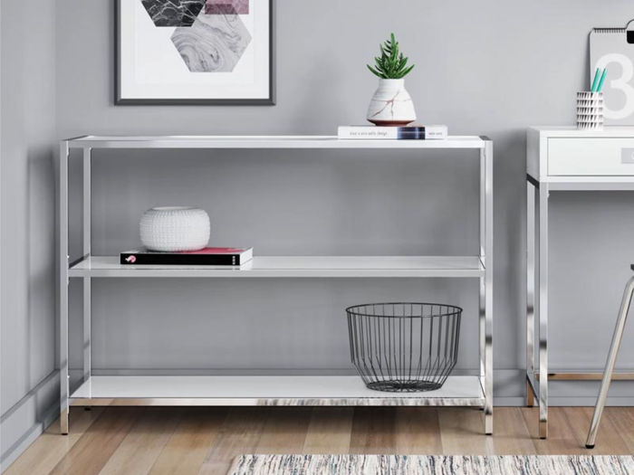 A sleek bookcase or console